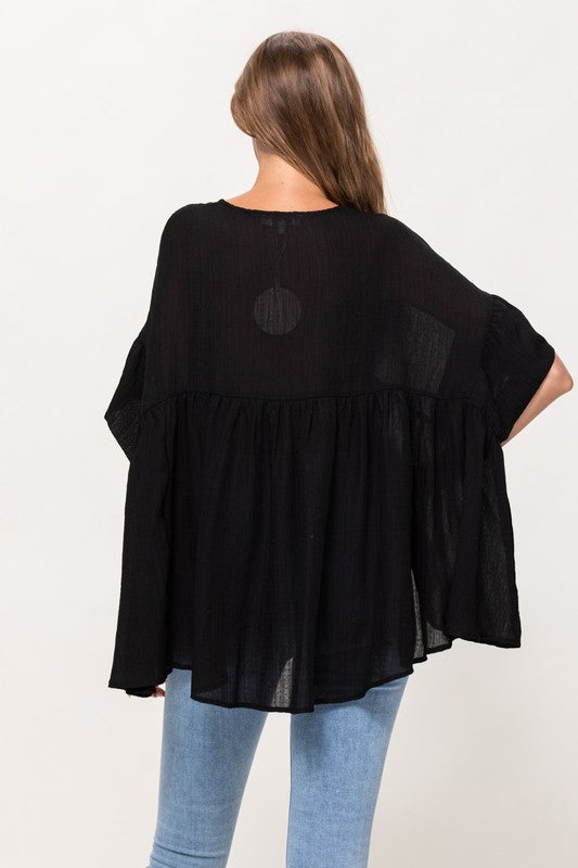 Blusa oversized